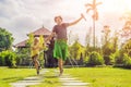 Dad and son tourists in Traditional balinese hindu Temple Taman Ayun in Mengwi. Bali, Indonesia. Traveling with children concept w Royalty Free Stock Photo