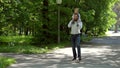 Dad and son walk in the park with a very slow gait.