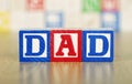 Dad Spelled Out in Alphabet Building Blocks Royalty Free Stock Photo