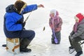 Dad spends his free time on the winter fishing