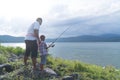 Dad teach his son fishing Royalty Free Stock Photo