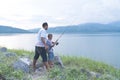 Dad teach his son fishing Royalty Free Stock Photo