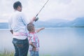 Dad teach his son fishing Royalty Free Stock Photo