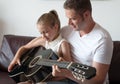 Dad teaches daughter. Royalty Free Stock Photo