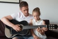 Dad teaches daughter. Royalty Free Stock Photo