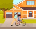 Dad teaches daughter to ride bike. Happy young man is helping smiling girl to ride bicycle on road