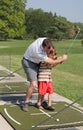 Dad Teaching Son Golf Royalty Free Stock Photo