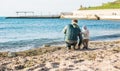 Dad and toddler son on the beach Royalty Free Stock Photo