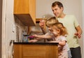 Dad with two kids brush teeth using toothbrush at bathrooms Royalty Free Stock Photo