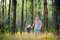 Dad walks in the park with his beloved daughter Royalty Free Stock Photo