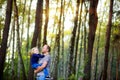 Dad walks in the park with his beloved daughter at sunset Royalty Free Stock Photo