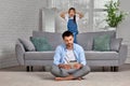 dad working with laptop while little child girl is bored Royalty Free Stock Photo