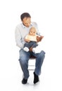 Daddy with his unhappy baby Royalty Free Stock Photo