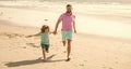 daddy with kid boy on summer day. dad and child having fun outdoors. childhood and parenting Royalty Free Stock Photo