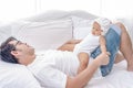 Daddy and little baby daughter tired after playing together. Father takes are of his little girls on the weekend Royalty Free Stock Photo