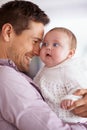 Daddy loves you more than anything. a young father holding his adorable baby daughter and showing her affection. Royalty Free Stock Photo