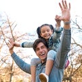 Daddy loves you this much. an adorable little girl having fun with her father at the park. Royalty Free Stock Photo