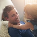 Daddy loves you so much. Shot of a single dad hugging his daughter at home. Royalty Free Stock Photo