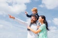 Daddy, mommy and child son. Happy family - child son playing with paper airplane. Portrait of happy father giving son Royalty Free Stock Photo