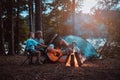 Daddy playing guitar for his wife and boys Royalty Free Stock Photo