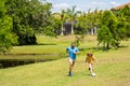 daddy with son improve fatherhood. summer happiness. Outdoor adventures of daddy and son fatherhood together. football