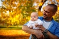 Daddy with son playing and having fun in the park Royalty Free Stock Photo