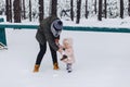 Daddy walking with snow-covered pine forest Royalty Free Stock Photo