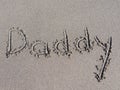 `daddy` is written on the sand Royalty Free Stock Photo