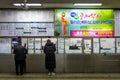 Daegu, South Korea - Ticket office in Daegu Bukbu Intercity Bus Stop. Advertising board about international marriage.