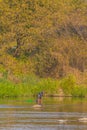 Man with greeen baske fishing in Kumgang river