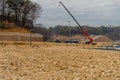 Man using crane at construction site