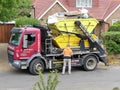 DAF skip loader truck belonging to J Byne Haulage Limited of Rickmansworth, Hertfordshire