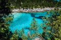 Dafnoudi beach in Kefalonia, Greece. Hidden bay with pure crystal clean turquoise sea water, surrounded by cypress trees