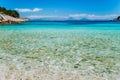 Dafnoudi beach in Kefalonia, Greece. Remote lagoon with pure clean turquoise sea water, white rocks and cypress trees