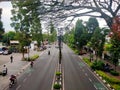 Dago Bandung street tree sky green fresh crowded lonelyroad morning sundaymorning autum bicycle Royalty Free Stock Photo