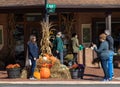 Displays of haybales with pumpkins, cornstalks, and potted mums add seasonal color in downtown Dahlonega, Georgia