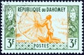 DAHOMEY - CIRCA 1961: A stamp printed in Dahomey from the `Artisans` issue shows Fisherman casting net, circa 1961. Royalty Free Stock Photo