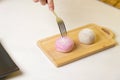 Daifukumochi, or Daifuku, is a Japanese confection consisting of a small round mochi stuffed with sweet filling, Japanese Royalty Free Stock Photo