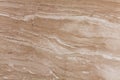 Daino reale, natural soft marble background, stone texture in light tone. Slab photo. Glossy beige pattern for exterior