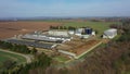 Cowshed cows dairy feeding barn drone aerial video shot, Holstein Friesian cattle breed milk, cow eat corn silage feed Royalty Free Stock Photo