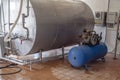 Dairy production. Metal tanks for cooling and storage of dairy products.