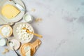 Dairy products border background. Milk, cheese and cottage cheese on table. Top view from above