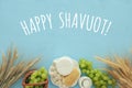 dairy products and fruits. Symbols of jewish holiday - Shavuot