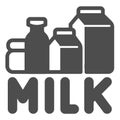 Dairy products and inscription milk solid icon, dairy products concept, Paper bags and bottles with milk sign on white Royalty Free Stock Photo