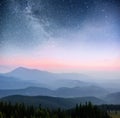 Dairy Star Trek in the woods. Dramatic and picturesque scene. Fantastic starry sky and the milky way Royalty Free Stock Photo