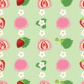 Pink Daifuku with strawberries and leaves isolated on green background.