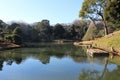 Daisensui Pond and Yukitsuri (snow hanging) in Rikugien Garden, Tokyo, Japan Royalty Free Stock Photo