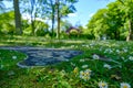 Daisies and footpath with daisy shapes at Leases Park in Necastle, UK Royalty Free Stock Photo