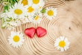 Daisy flower bouquet and red heart chocolates