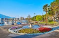 The fountain with flower beds in park on Lake Maggiore, Locarno, Switzerland Royalty Free Stock Photo